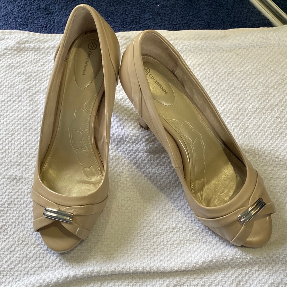 Beige open toe pumps